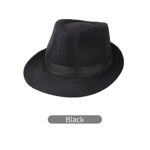 Close-up of black straw weave texture and ribbon detail on the men's fedora hat