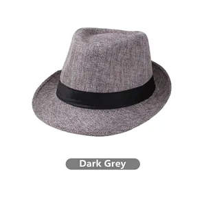 Detail view of a dark gray fedora hat with black grosgrain ribbon and classic curved brim