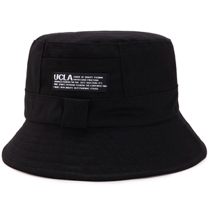 Detail view of cotton bucket hat featuring UCLA rectangular patch and twill fabric texture