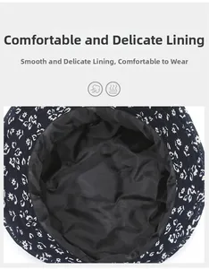 Detail of blue floral sun hat showing smooth black silk lining for comfort and breathability