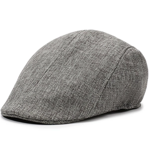 Close-up of grey linen flat cap fabric texture showing breathable woven pattern