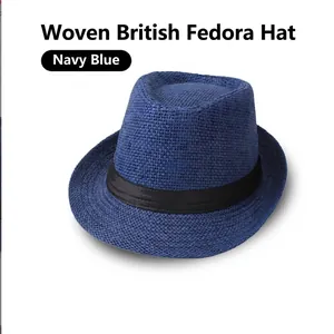 Detail of navy blue linen jazz hat featuring a black decorative band and textured weave