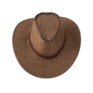 Detail of brown checkered weave straw cowboy hat with twisted rope and wide stitched brim