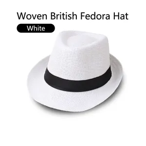 Detailed close-up of white woven linen fedora hat featuring breathable mesh and black band