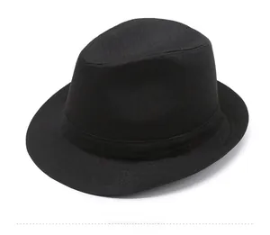 Close-up of black fedora hat showing detailed herringbone texture and matching decorative band