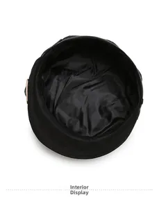 Detail view of the neat inner lining and stitching of the black stripe fashion hat