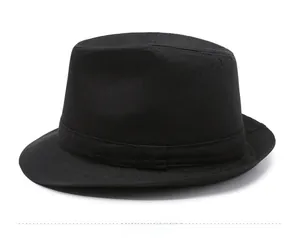 Detailed side view of black herringbone texture fedora hat with matching ribbon band