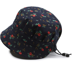 Foldable navy floral bucket hat for women with adjustable drawstring on white background
