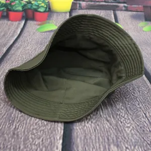 Close-up of deep olive green canvas sun hat featuring reinforced brim stitching details