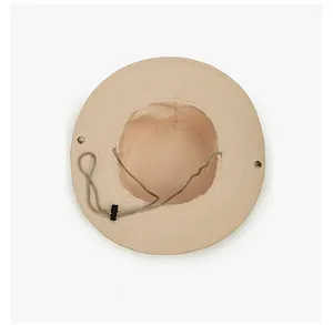 Detail view of khaki sun hat interior with adjustable windproof strap and metal buckles
