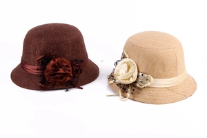 Elegant linen cloche hats for women in brown and beige with floral mesh accents