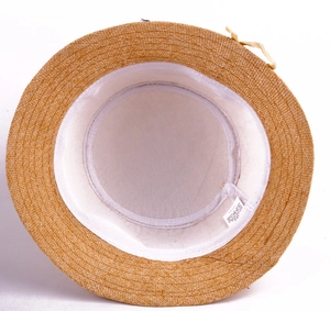 Detail view of linen sun hat interior with breathable lining and 100% polyester wash label
