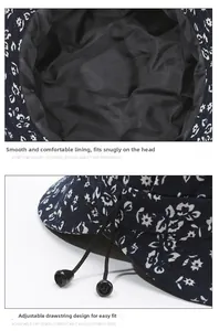Detail of floral bucket hat featuring smooth inner lining and adjustable drawstring cord