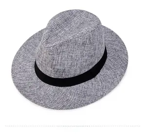 Detail view of the gray woven linen fedora hat with a classic black ribbon band