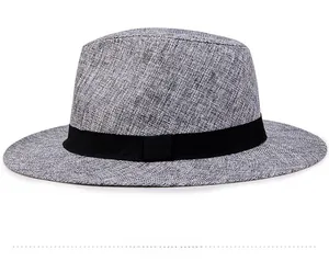 Detail showing the gray linen texture and black decorative band of the men's fedora hat
