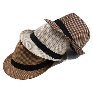 Detailed view of woven straw fedora hats in three colors with black satin ribbon bands
