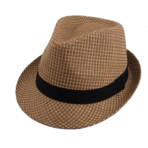 Detailed close-up of breathable straw texture and black grosgrain ribbon on fedora