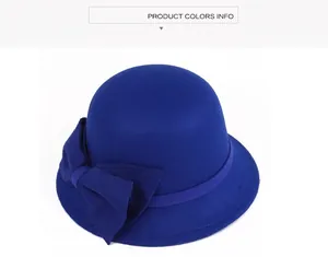 Detail of royal blue wool cloche hat with an elegant oversized bow decoration