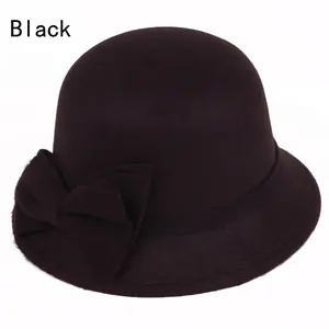 Elegant wool felt cloche hat for women with a side bow accent and round dome design
