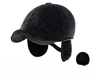 Detailed view of the winter baseball cap featuring foldable plush ear flaps for warmth
