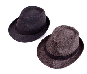 Close-up of herringbone texture and black grosgrain ribbon on winter trilby jazz hats