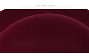 Detailed macro view of burgundy wool fabric texture showing premium thick density