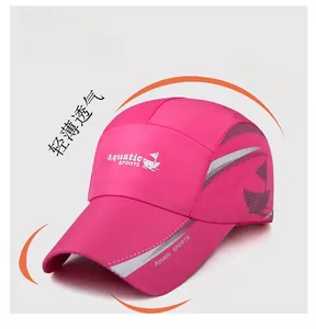 Close-up of fuchsia sports baseball cap featuring quick-dry fabric and reflective trim