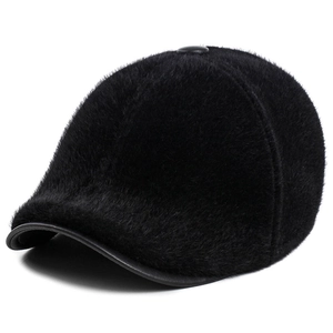 Detailed close-up of premium black faux mink fur winter baseball cap with leather trim edge