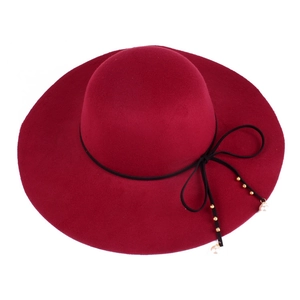 Elegant wide-brim wool fedora in burgundy with black bow ribbon and pearl accents