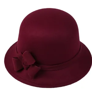 Elegant wine red wool cloche hat for women featuring a side flower and adjustable band