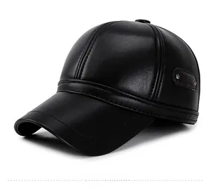 Close-up of black leather baseball cap featuring lychee texture and metallic side rivets