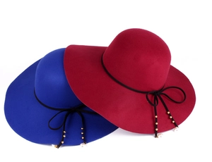 Elegant wide brim felt hats in red and blue with delicate pearl bow decorations