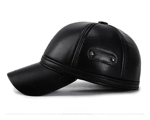 Detail of black leather baseball cap featuring ear flaps and textured side stitching