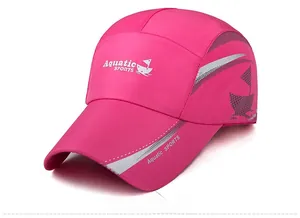 Detail of rose red baseball cap with white Aquatic Sports print and sailboat logo