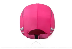 Macro detail of pink sports cap back with reflective strip and adjustable buckle strap