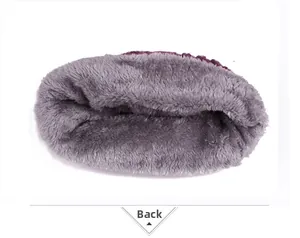 Detailed view of the thick grey fleece lining inside the purple winter knitted hat