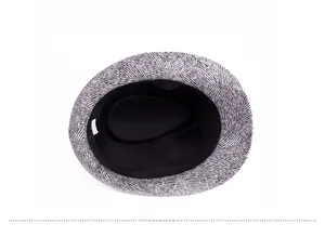 Internal view of men's herringbone fedora hat featuring black lining and care label