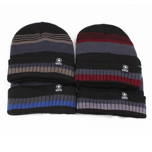 Mens winter knit beanies with fleece lining and sports logo in four striped colors