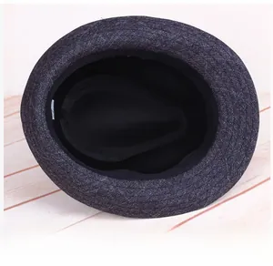 Detail showing the inner lining, sweatband and fabric texture of the men's fedora hat