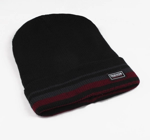 Detail of winter knit beanie with fashion patch and thick thermal lining material