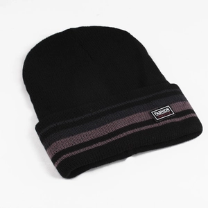Detail of black knit beanie with purple-grey stripes and Fashion New Style patch