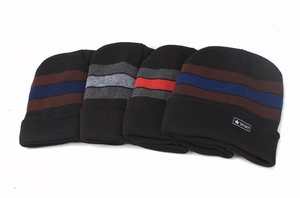 Detail view of four winter beanies with knit stripes and sport star label icons