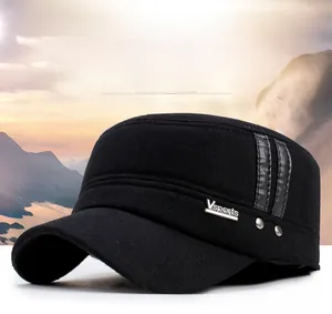 Detail of wool cadet cap featuring Vsports metal logo and decorative leather straps