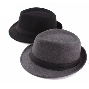 Detail of grey and black wool felt fedora hats with grosgrain ribbon decoration