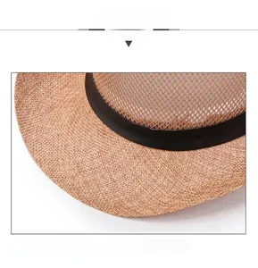 Close-up of breathable mesh panel and woven straw texture on outdoor summer sun hat