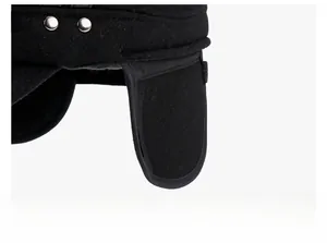 Detail of thickened ear flaps and metal rivet on black wool winter baseball cap