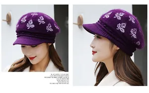 Detail of purple knitted beret with white leaf jacquard and fuzzy rabbit hair texture