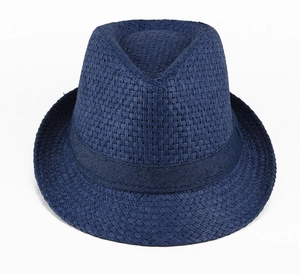 Detailed close-up of navy blue straw fedora with woven texture and grosgrain band