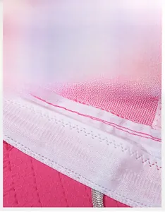 Detail of pink sun hat featuring a wide moisture-wicking sweatband and breathable mesh fabric