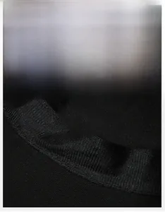 Detail view of the wide moisture-wicking sweatband inside a breathable black sun hat